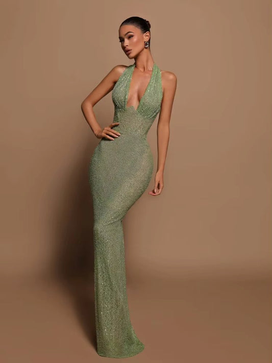 Selvara – Green sequin dress with open back and halter neckline